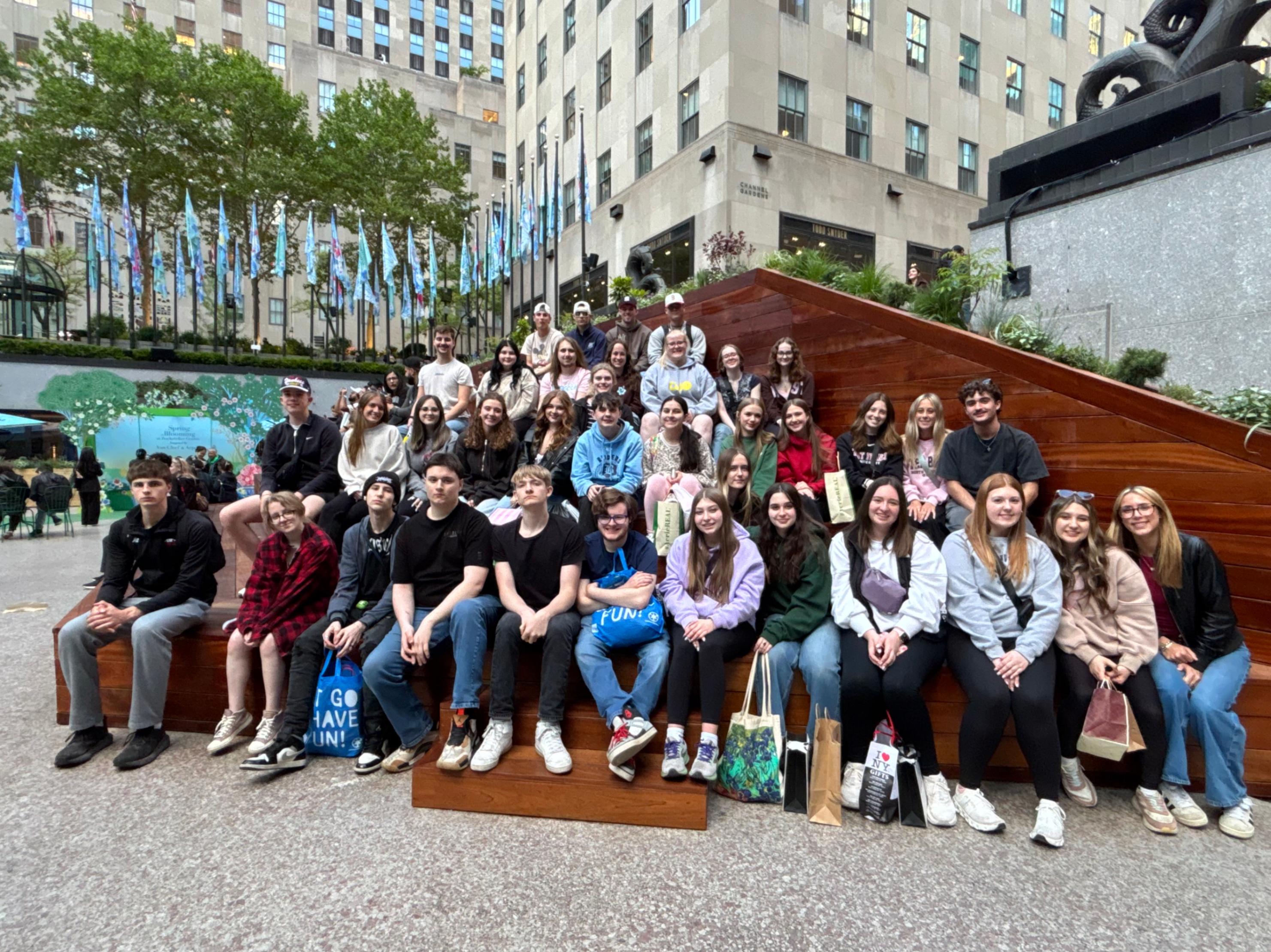 Seniors that attended the senior trip to New York City pose for a photo outside of Rockefeller plaza.